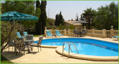 A beautiful poolside view from one of the luxury villas at La Datcha, Spain